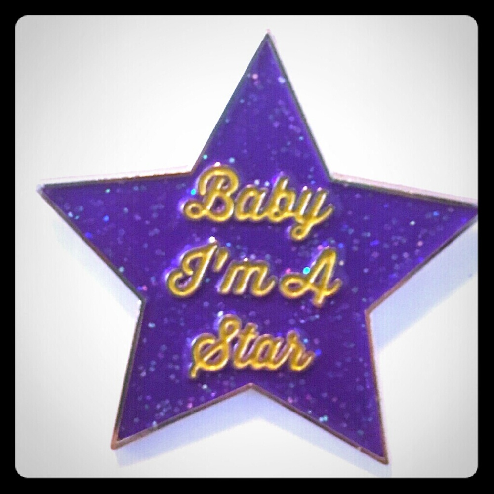 Prince: Baby I'm a Star gold & purple enamel pin.